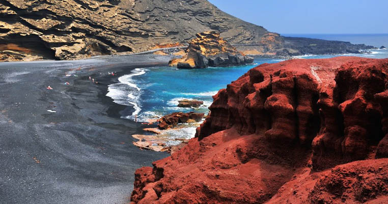 Beach with volcanic black sand in Lanzarote, Canary Islands