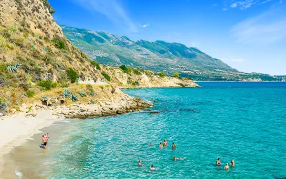 Swim to an islet from Agios Stefanos Beach